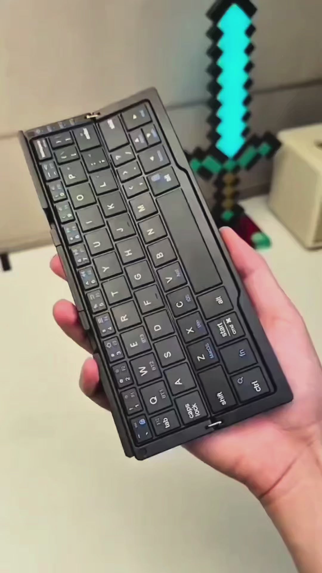 TITAN Ultra-Mini Foldable Bluetooth Keyboard with Built-In Stand